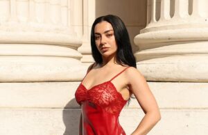 GOSSIP99 : Charli XCX turns heads in a sexy red dress as she joins lace-clad Daisy Edgar-Jones at the star-studded Saint Laurent show during Men’s Paris Fashion Week