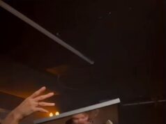 GOSSIP99 : Jake Hall’s ex Chloe Lewis kisses a picture of the late star while dancing on stage as his brother performs a DJ set and mourners bounce on vast art installation at ‘unconventional’ funeral