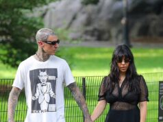 GOSSIP99 : Kourtney Kardashian stuns in sheer outfit as she cuddles son Rocky, two, during Central Park ride with Travis Barker