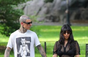 GOSSIP99 : Kourtney Kardashian stuns in sheer outfit as she cuddles son Rocky, two, during Central Park ride with Travis Barker