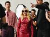 GOSSIP99 : Madonna, 67, turns heads as she rocks a red lace minidress at Saint Laurent’s star-studded show during Men’s Paris Fashion Week