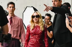GOSSIP99 : Madonna, 67, turns heads as she rocks a red lace minidress at Saint Laurent’s star-studded show during Men’s Paris Fashion Week