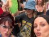 GOSSIP99 : Margot Robbie blends in with concertgoers as she wears a baseball T-shirt and tiny shorts while partying at the Bad Bunny concert in London