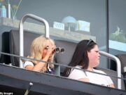 GOSSIP99 : Sabrina Carpenter uses binoculars to see as she makes surprise appearance at Ecuador’s thrilling World Cup victory over Germany