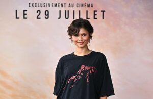 GOSSIP99 : Zendaya wears vintage $35 Spider-Man T-shirt as a dress as she shares a sweet moment with husband Tom Holland at Brand New Day event in Paris