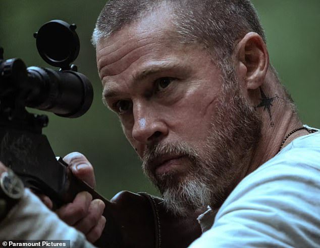 GOSSIP.CO.UK : Brad Pitt fans go wild for his tattooed tough guy in the survival movie Heart Of The Beast… even though the DOG steals the show