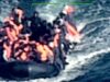 GOSSIP.CO.UK : Chilling drone footage shows dozens crammed onto small boat as pilot jailed